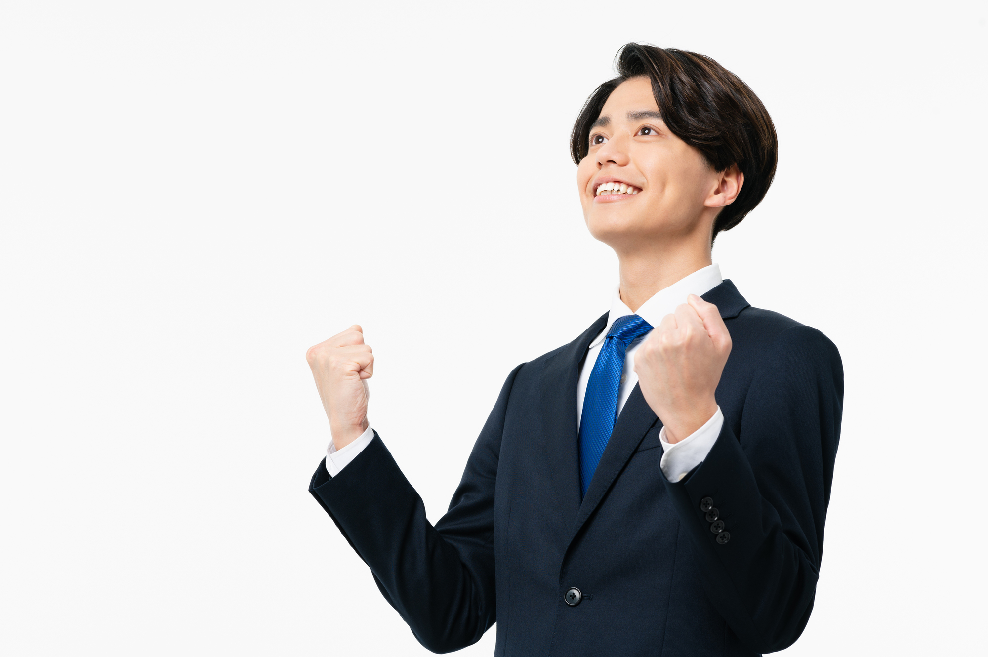 ガッツポーズする男性